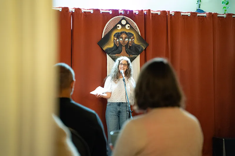 Emily Sadowski speaking on stage at the Chosen Book Festival